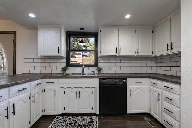 kitchen featuring white cabinets, dishwasher, sink, dark hardwood / wood-style flooring, and backsplash