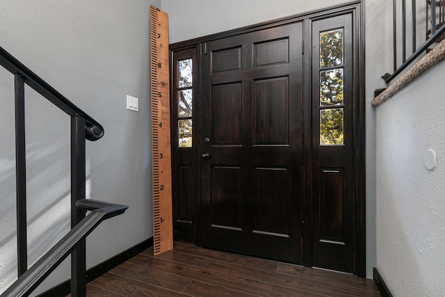 foyer entrance featuring dark hardwood / wood-style flooring