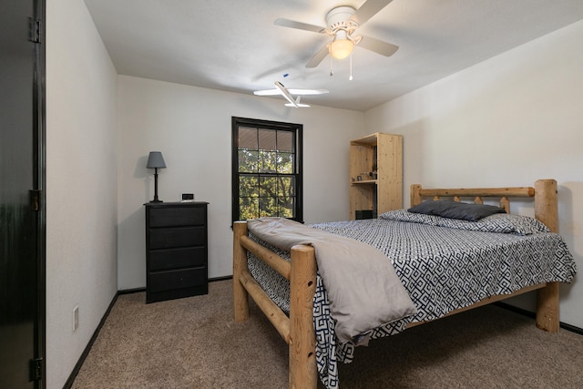 bedroom with ceiling fan and carpet