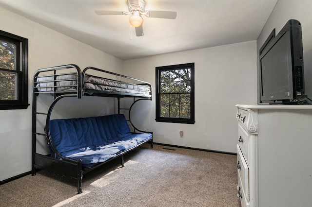 bedroom with carpet flooring and ceiling fan