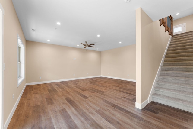 empty room featuring ceiling fan and hardwood / wood-style flooring