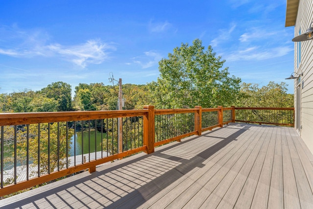 deck featuring a water view