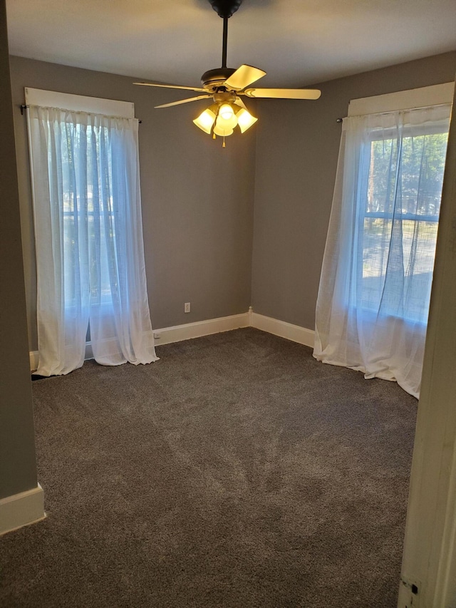 carpeted empty room with ceiling fan