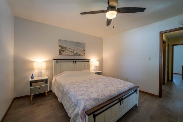 bedroom featuring ceiling fan and dark hardwood / wood-style floors