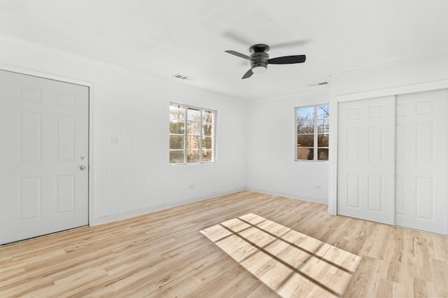 interior space featuring light hardwood / wood-style floors and ceiling fan