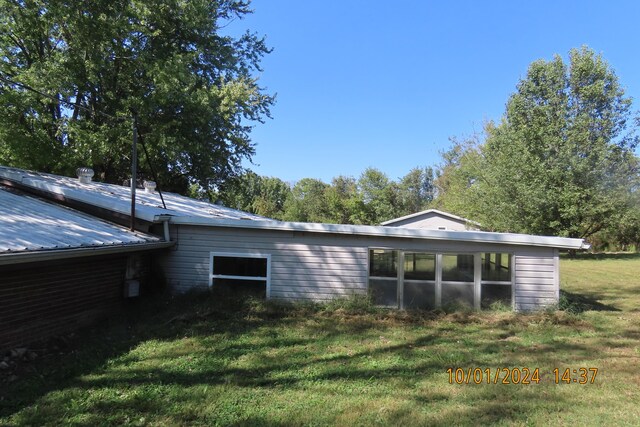 1504 S 14th Ave, Ozark, MO 65721 - view of home's exterior with a yard