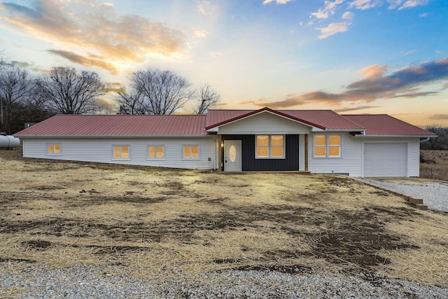 single story home with a garage