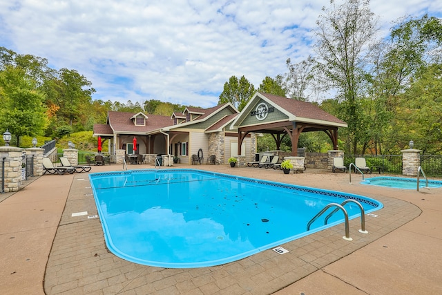 view of pool with a gazebo and a patio