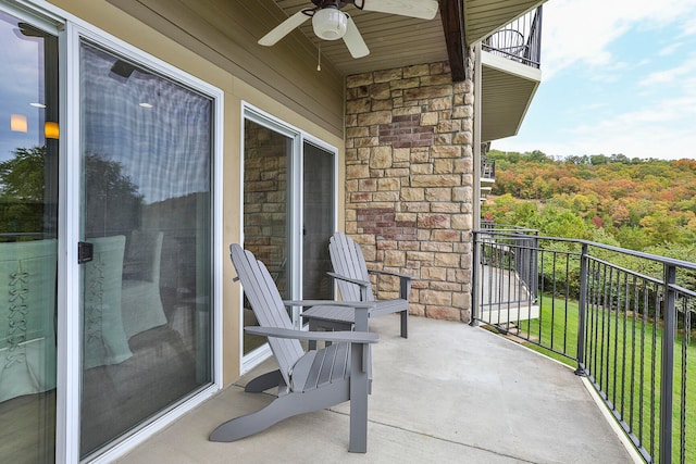 balcony featuring ceiling fan