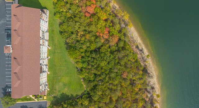 bird's eye view with a water view