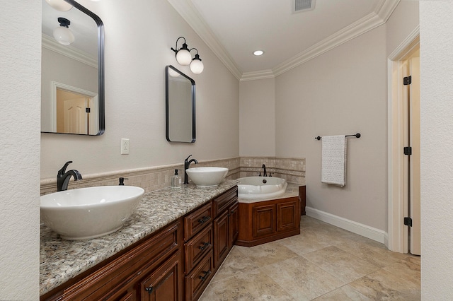 bathroom featuring crown molding and vanity