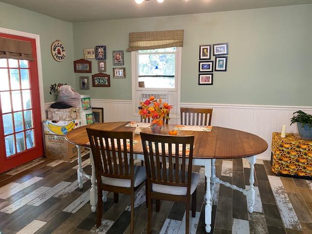 dining room with dark hardwood / wood-style floors