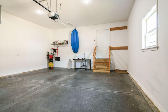 garage featuring a garage door opener