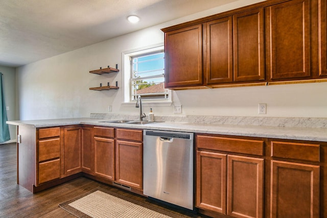 kitchen featuring sink, stainless steel dishwasher, and dark hardwood / wood-style floors