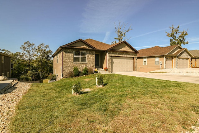 view of front of home with a garage and a front lawn