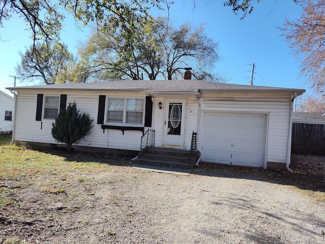 single story home with a garage