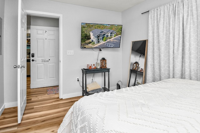 bedroom featuring hardwood / wood-style flooring