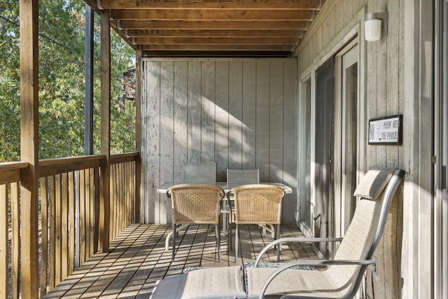 sunroom / solarium featuring a healthy amount of sunlight