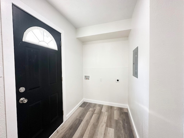 entryway featuring electric panel and wood-type flooring