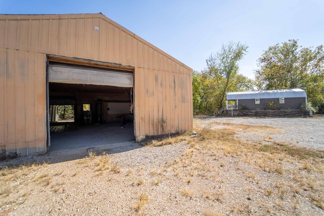 view of outbuilding with a garage