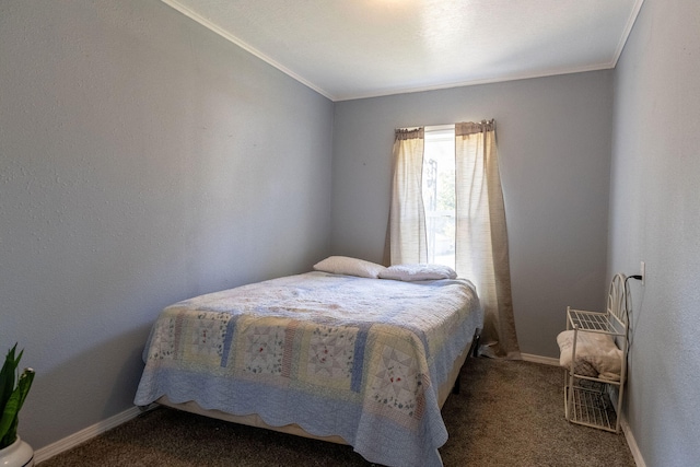 bedroom with crown molding and carpet