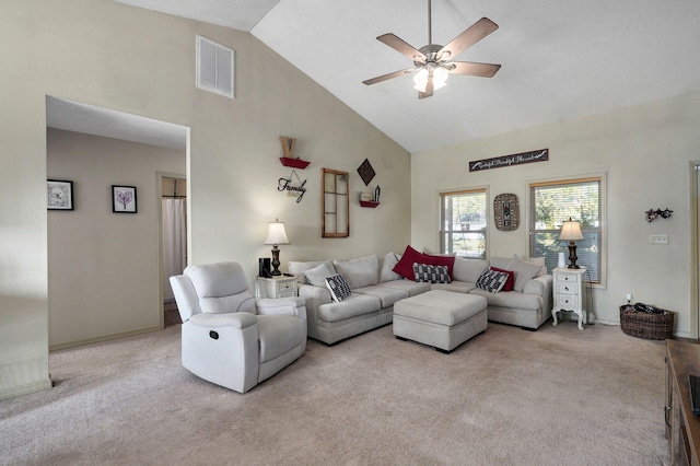 living room featuring light carpet, high vaulted ceiling, and ceiling fan