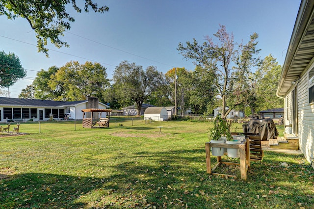 view of yard featuring a deck