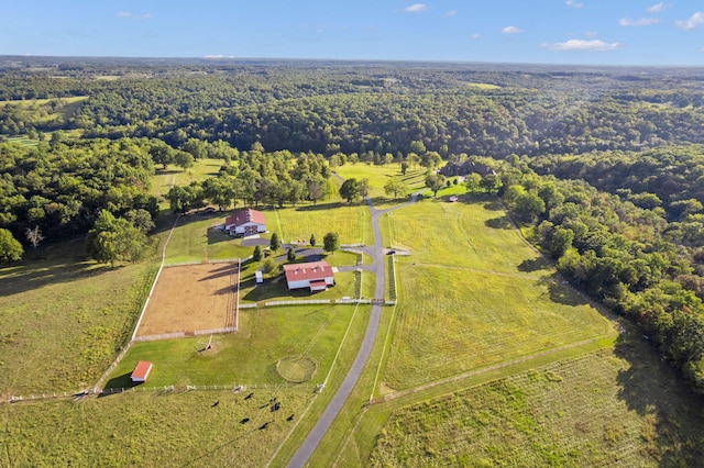 birds eye view of property with a rural view