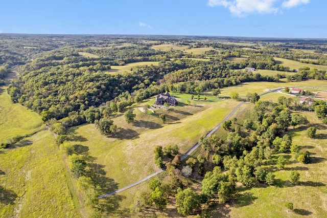 birds eye view of property featuring a rural view