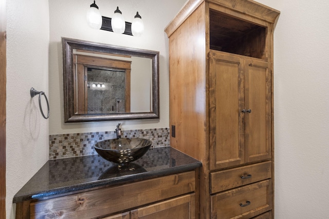 bar featuring a sink and backsplash