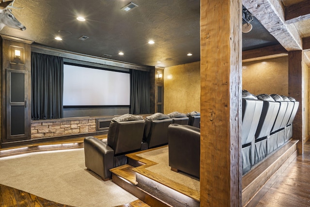 cinema featuring wood finished floors, visible vents, and recessed lighting