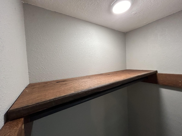 unfurnished office featuring a textured ceiling