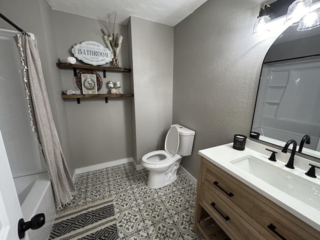 full bathroom with tile patterned floors, vanity, toilet, and shower / bath combination with curtain