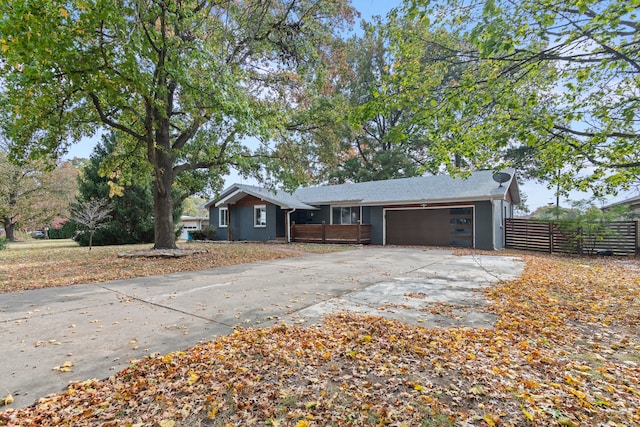 single story home with a garage