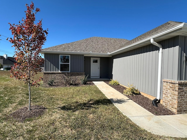 view of front of home with a front yard