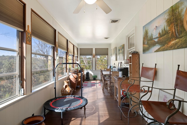 sunroom / solarium with ceiling fan