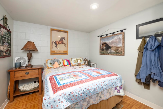 bedroom featuring light parquet floors