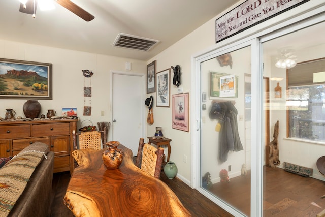 dining room featuring dark hardwood / wood-style floors and ceiling fan