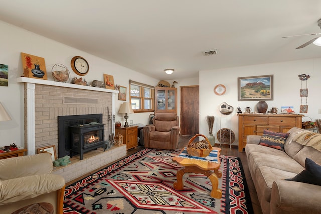 living room featuring ceiling fan and wood-type flooring