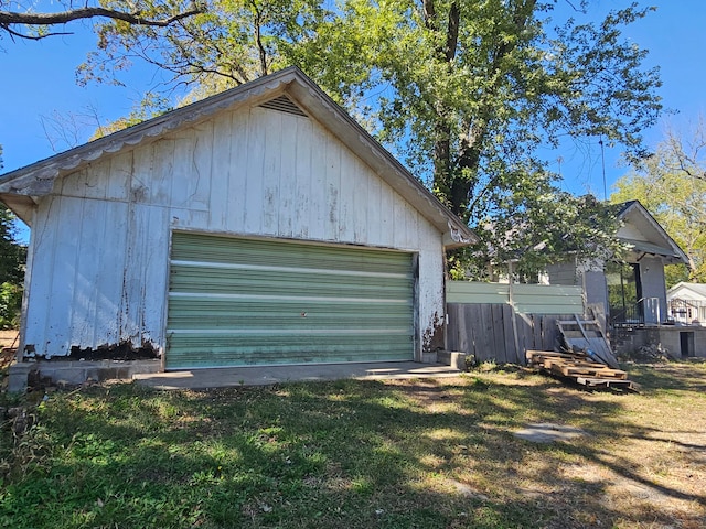 garage with a yard