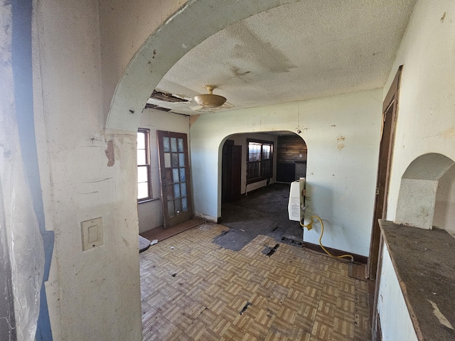 foyer featuring arched walkways