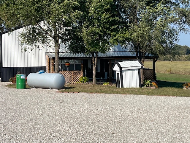 view of outdoor structure with a lawn