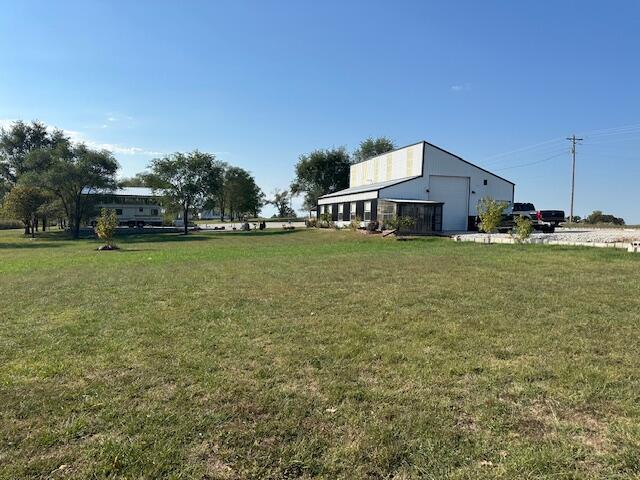 view of yard with a garage