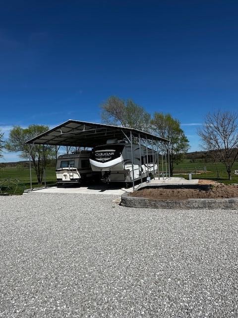 view of car parking featuring a carport