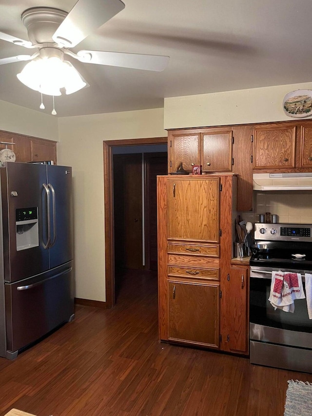 kitchen with range hood, ceiling fan, stainless steel appliances, and dark hardwood / wood-style flooring