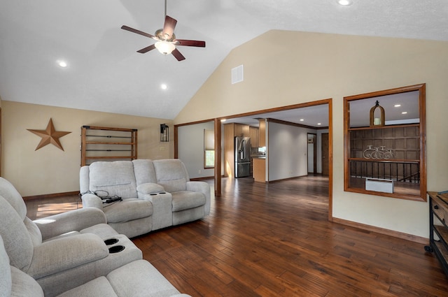 living room featuring ceiling fan, high vaulted ceiling, and dark hardwood / wood-style flooring