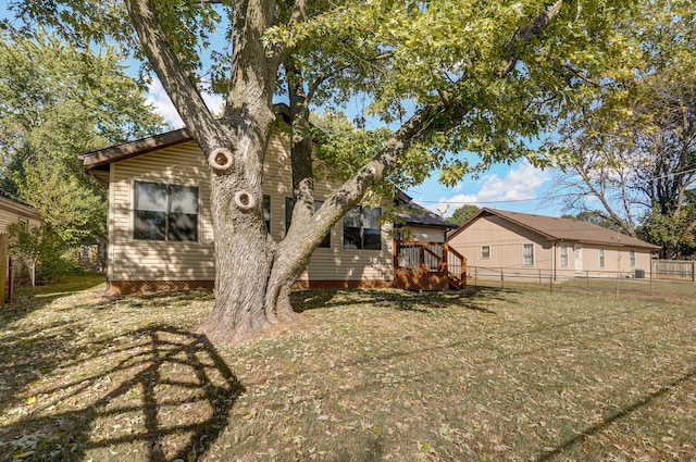 back of house with a yard