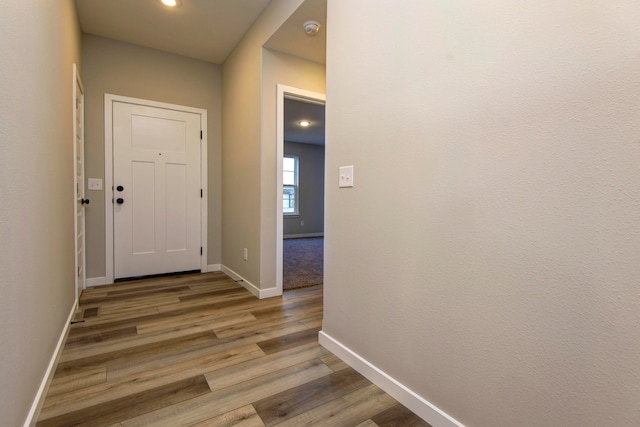 hall featuring hardwood / wood-style flooring