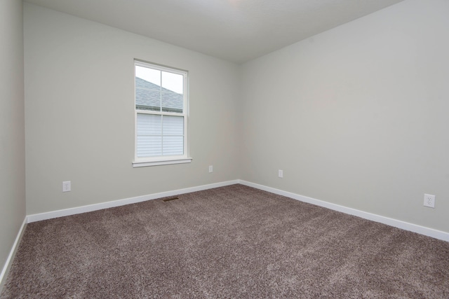 empty room with carpet floors