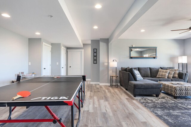 game room featuring ceiling fan and light hardwood / wood-style floors